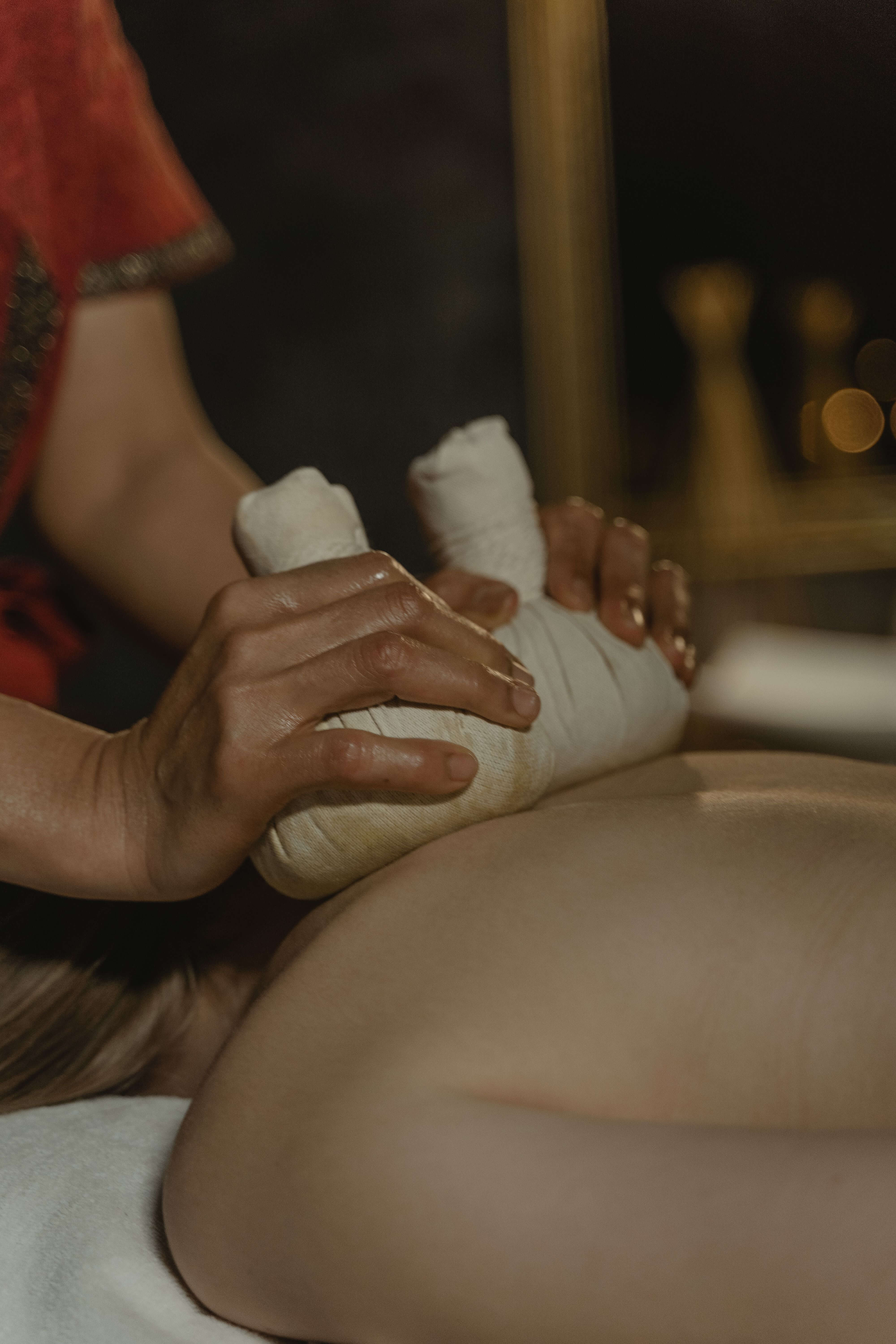 Thai massage stretch on a padded floor mat
